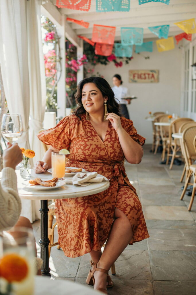 23 Plus Size Cinco de Mayo Outfit Ideas for the Cutest Fiesta Look Ever 15 plus size cinco de mayo outfit ideas flutter sleeve wrap dress restaurant lunch